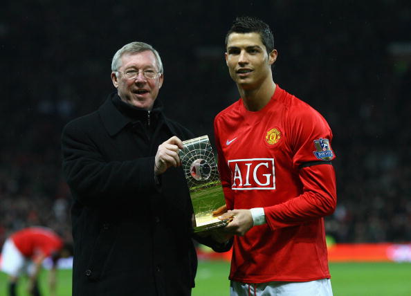 Cristiano Ronaldo of Manchester United and Manager Sir Alex Ferguson pose with the Fifa World Player of the Year Award 2008 won by Ronaldo (2009)