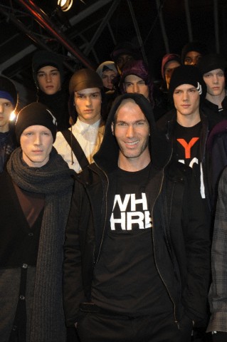 Zinedine Zidane poses as he attends the Adidas & Y3 Menswear Autumn - Winter 2010 cocktail presentation in Paris.