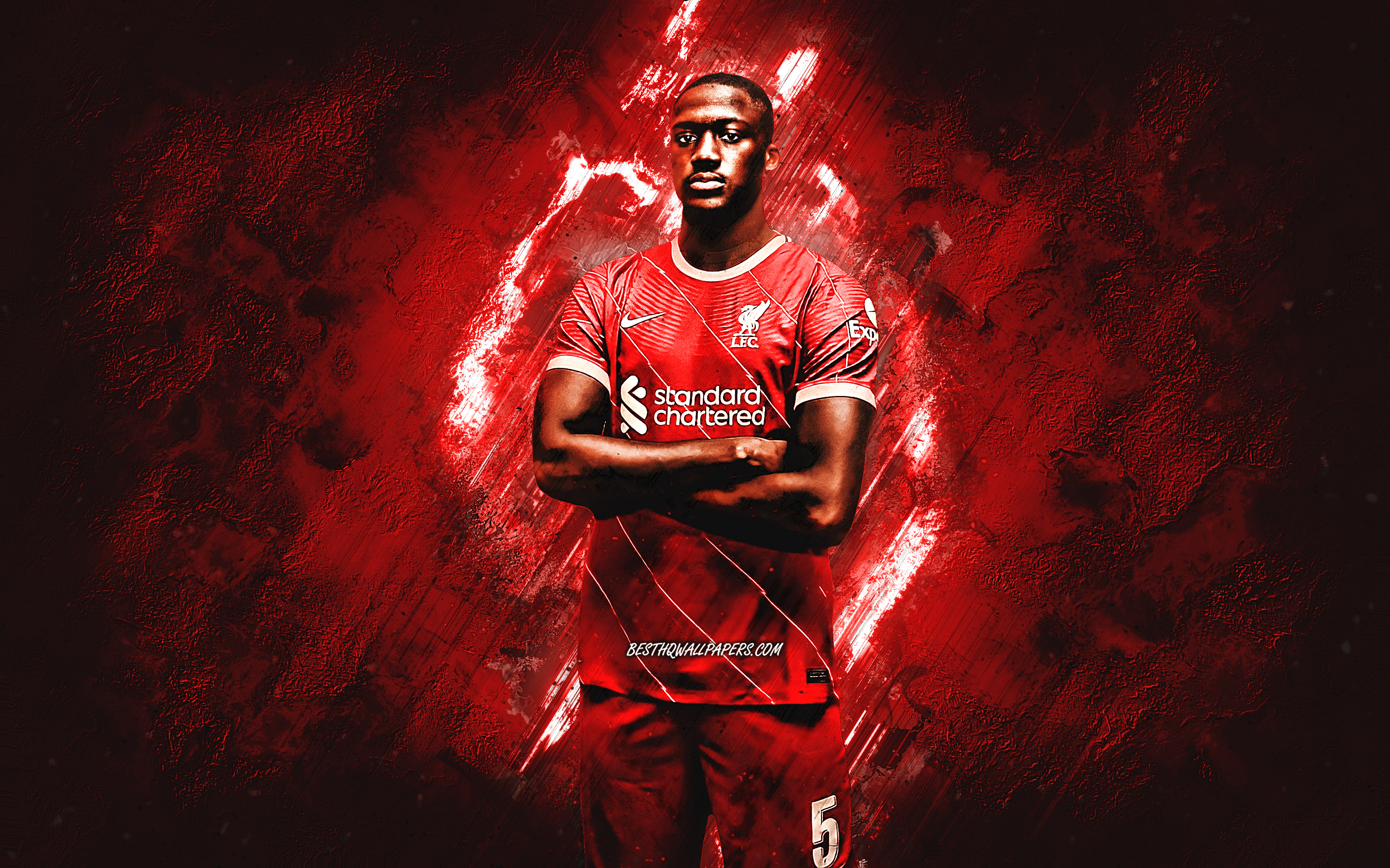 https://cdn.tarafdari.com/tarafdari-static-files/ts10.tarafdari.com/contents/user8830/content-image/ibrahima-konate-liverpool-fc-french-footballer-portrait-red-stone-background.jpg