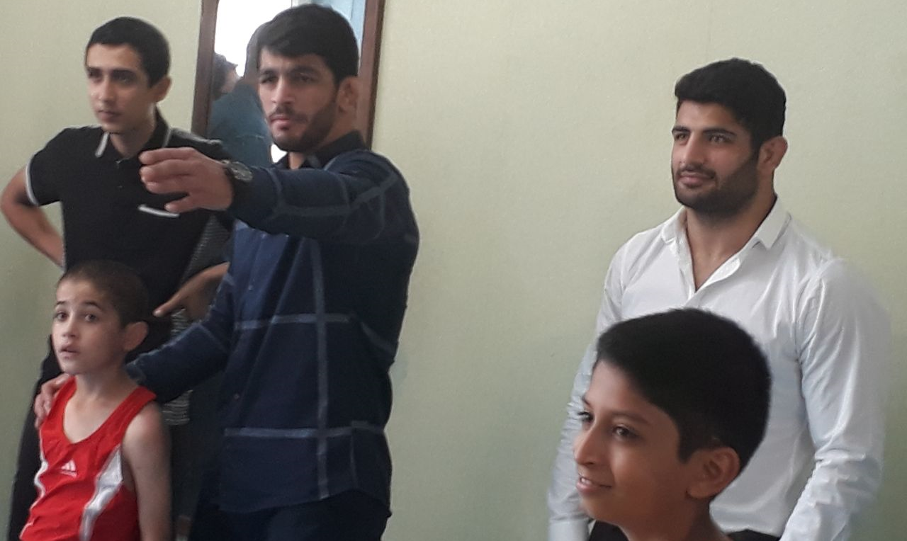 حضور قهرمانان کشتی در یک مرکز خیریه؛ از هادی و کریمی تا یزدانی و اخلاقی