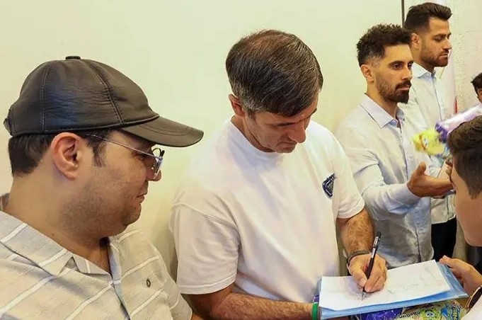 عکس از محمد ربیعی و کریم باقری در بیمارستان امام خمینی